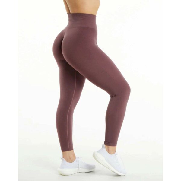 Women's Tapered Casual Style High Waisted Seamless Stretch Legging composed of 38% polyester, 11% elastane, and 51% polyamide.