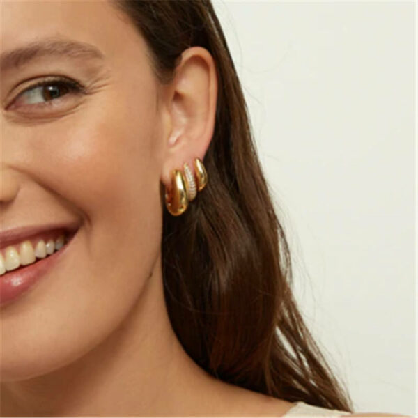 Bold and striking fine jewelry earrings with a U-shaped ear cuff adorned with diamonds for a cutting-edge look - Image 5