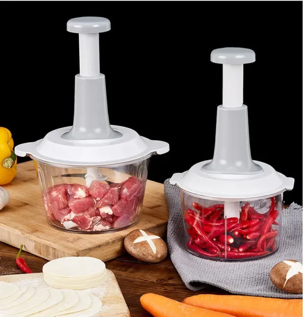 A new device that includes a manual fruit and vegetable slicer, onion chopper, small meat grinder, and kitchen cutting tools. It is a press-type meat grinder. - Image 7