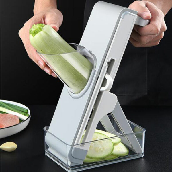 Multifunctional Vertical Vegetable Grater with Rotating Fruit and Vegetable Slicer Shredder in a Kitchen - Image 6