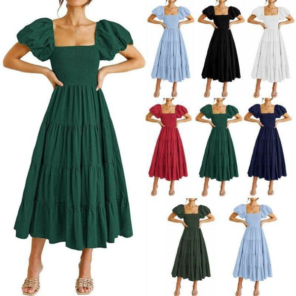 See this adorable women's summertime flowy smocked midi dress with a square neck and puffy sleeves. - Image 2