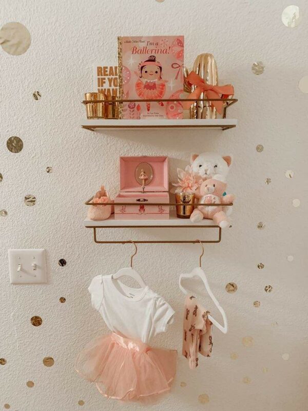 Well-liked Floating Shelves for Decoration Two hanging wall shelves with a golden towel rack that double as decorative storage shelves