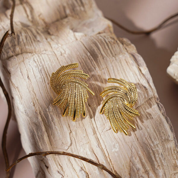 18K gold-plated, spiral-splash textured brass stud earrings that are stylish and vintage. - Image 3