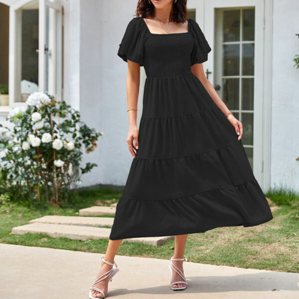 See this adorable women's summertime flowy smocked midi dress with a square neck and puffy sleeves. - Image 5