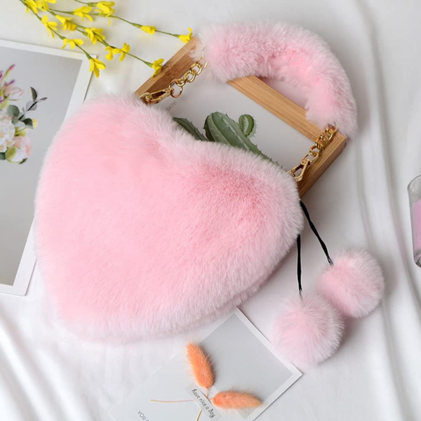 Heart-shaped, fluffy, faux fur shoulder bag that is lightweight, eco-friendly, and ideal for ladies and girls in the fall and winter