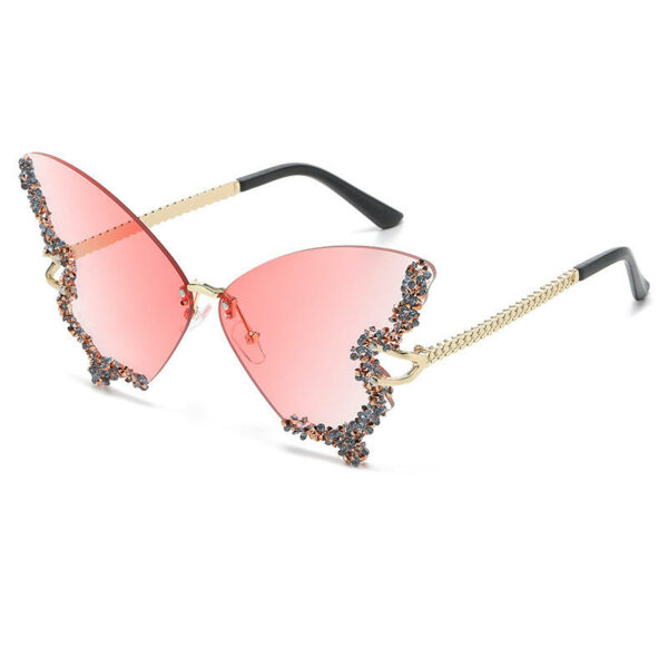 Solbriller's new butterfly-shaped diamond-rimless sunglasses are perfect for any fashion-forward woman with a bold and glamorous style. - Image 6