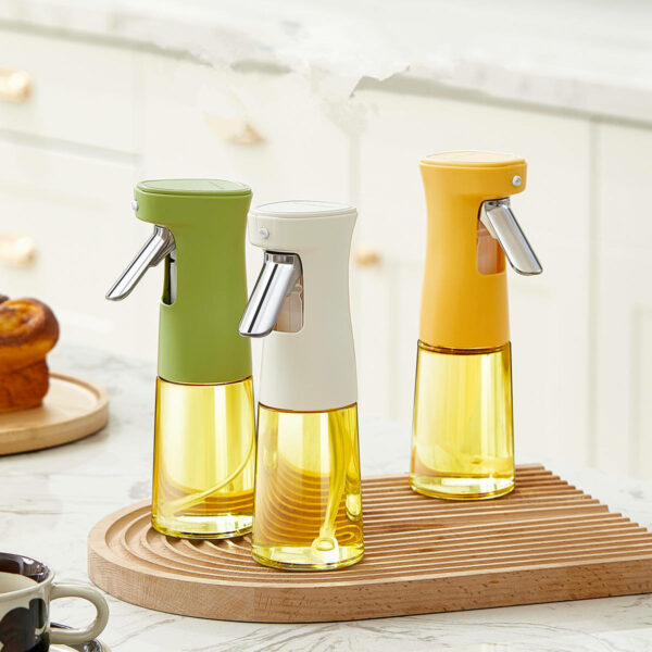 Glass olive oil sprayer, mister bottle, and kitchen accessories for salad, canola oil spritzer, and cooking oil sprayer which are widely used